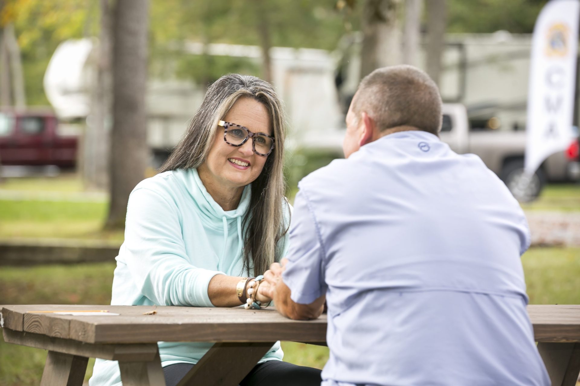 Angie Vaughn and her husband outside.